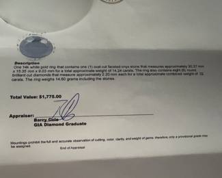 #158 - $950 - 14kt white gold custom made ring with 6 round diamonds and large 14.24 approx black onyx stone. Ring gold weight 14.60 grams. includes appraisal by Bere. 