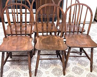 6 matching wooden chairs