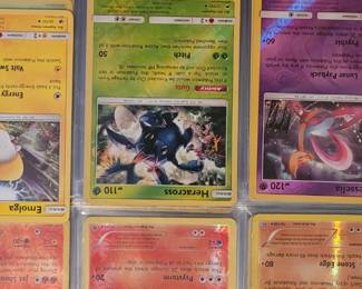 Part of a book of over 300 Pokémon cards