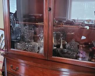 Vintage bow front glass front China cabinet