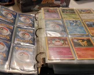 A book of over 300 Pokémon cards