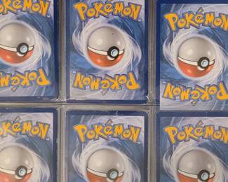 Part of a book of over 300 Pokémon cards
