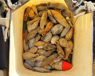 Mold to make sinkers plus a bucket of sinkers