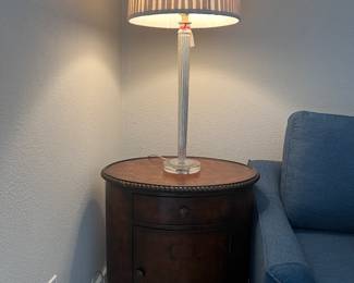 This sweet little wood table has a drawer and door to open for storage!