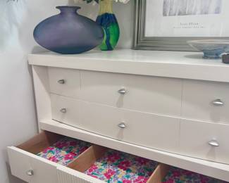 Modern white dresser with metal bow handles