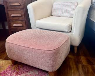 White armchair with pink ottoman 