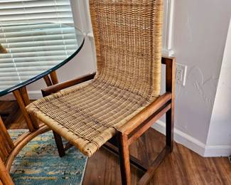 Dining chairs set (4 total). Glass top bamboo dining table with 4 chairs. Mid-century modern cane and walnut dining chairs. 