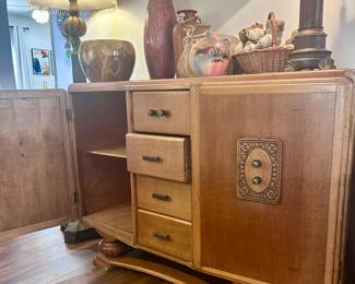 Solid wood vintage Art Deco buffet. Unusual crafted front shaping.