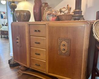 Solid wood vintage Art Deco buffet. Unusual crafted front shaping.