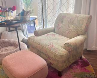 Lounge armchair and pink ottoman