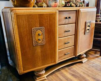 Solid wood vintage Art Deco buffet. Unusual crafted front shaping.