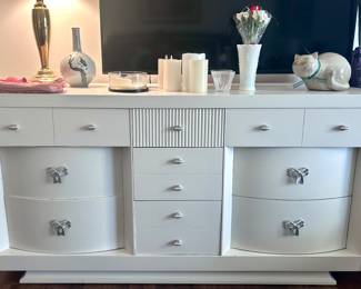White dresser with metal bow handles