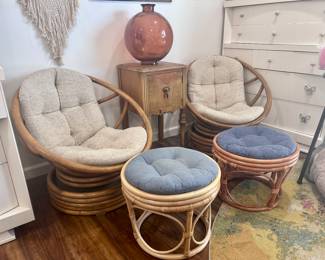 Rattan cushioned chairs with foot rests