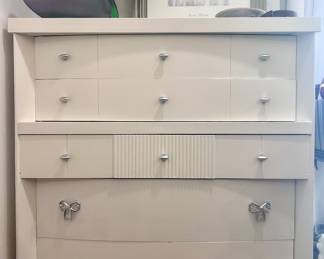 Modern white dresser with metal bow handles