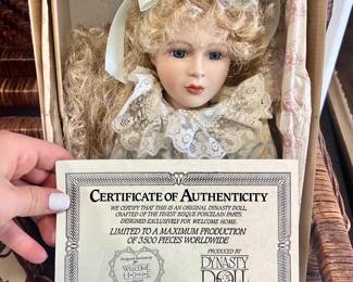 Vintage collectible dolls with authenticity certificates