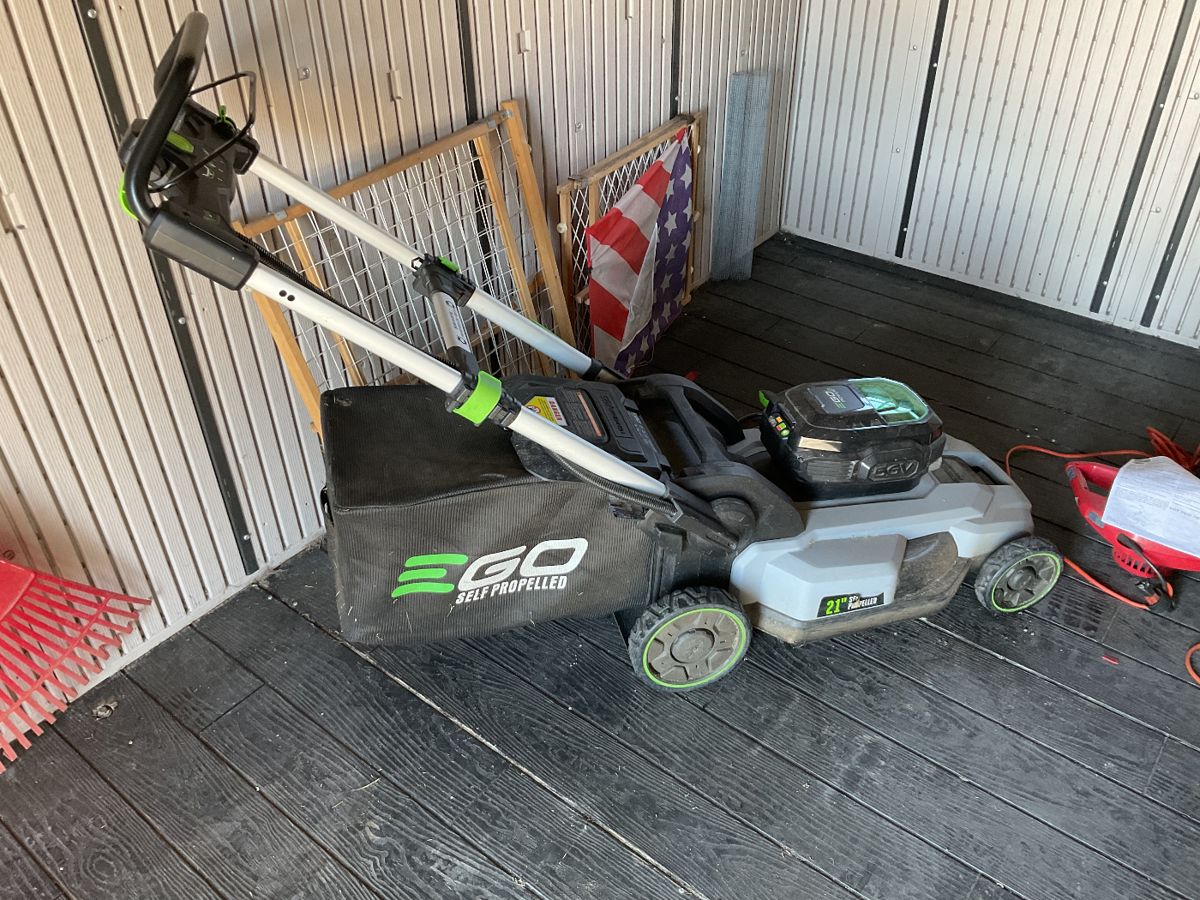 56 volt EGO battery powered lawnmower with bagger. Excellent condition. 21 inch with battery and charger.