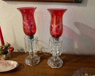 Two beautiful vintage lamps with red shades.