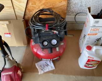 Porter Cable pancake compressor.