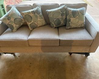 This almost brand new couch with pillows. Who is ready for a nap?