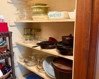 Vintage Pyrex and cast iron pots and skillets