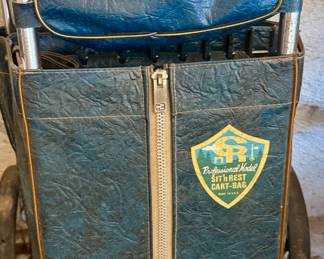 Vintage golf caddy and we also have some vintage clubs. 