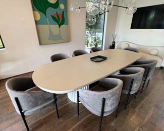 $2000 for the dining room table from rove concepts, $1000 for the 8 chairs