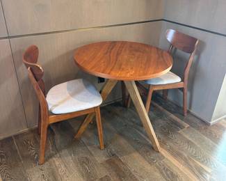 $400 for the table and $150 each for the chairs