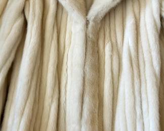 You can almost feel the softness of his beautiful fur through the picture - from Galanos.