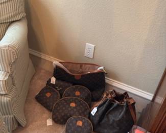 Designer handbags and travel sets