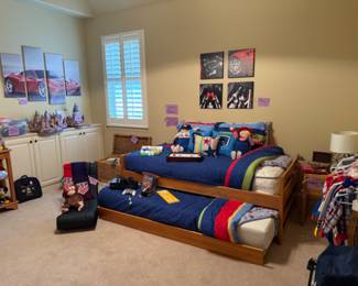 Children's twin trundle bed with mattresses. Toys , artwork and so much more.