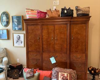 beautiful armoire, totes and bedding. Antique family keepsake frames.