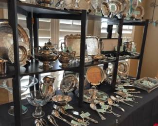 A vast collection of sterling serving pieces