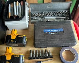 Extra drill batteries, socket set, flaring set