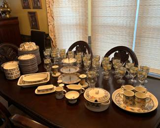Dishes and glasses. Sold as separate sets