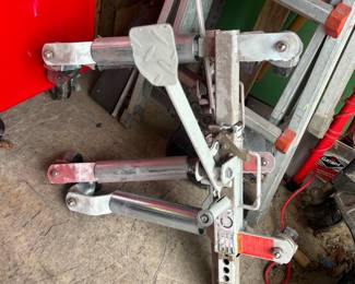Set of four Go-Jack style car jacks