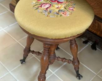 Claw foot adjustable antique stool