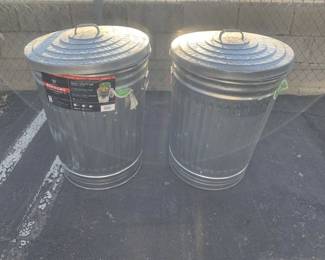 Lot # : 416f - Two 31 gallon galvanized metal trash cans with lids
