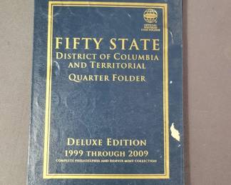Lot # : 147 - Fifty states district of Columbia and 
territorial quarter folder deluxe edi1999 through 2009 .