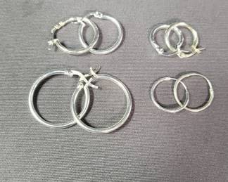 Lot # : 139 - Four pairs of sterling silver hoop earrings
