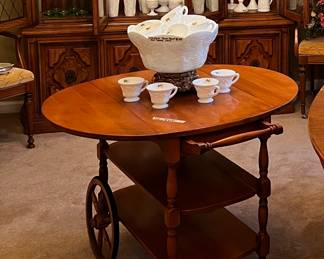 Milk glass. Wheeled drop leaf serving cart