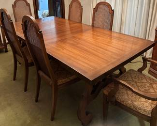 Dining room table with cane back chairs