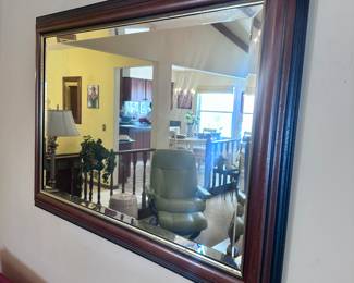 Large beveled glass mirror.