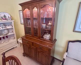 Lighted Ethan Allen china cabinet.