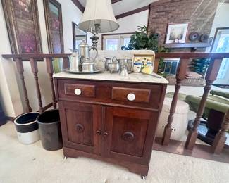 Antique washstand with marble top.