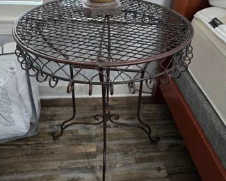 Lots of metal work tables, planters, wall holders & more