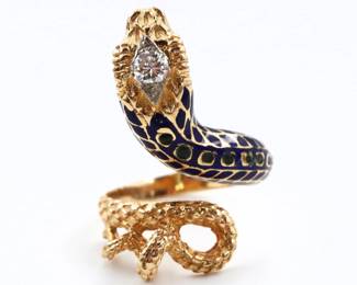 A Grecian 18k Gold and Diamond figural Snake ring.  Features a half bezel set round cut Diamond, approx. 3 mm, on a Snake band with multicolor enameled detail.  Marked "750 / SW9" and "Greece".  9.1 grams total.  Band repaired with some loss to enamel.  Size 7 1/2.