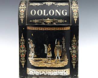 A turn of the century Toleware floor tea bin.  Tin box with domed cover and stenciled decoration with characters.  Surface wear and some denting.  19 x 22 x 27" high overall.  
