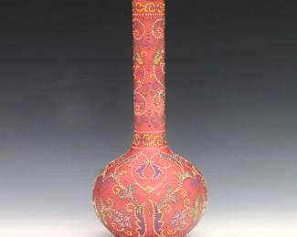 An early 20th century Art Glass vase, possibly by Thomas Webb.  Bottle form cased glass bottle with Pink satin exterior and enameled multi-color "Tapestry" decoration.  Minor wear to enamel.  10 1/4" high.