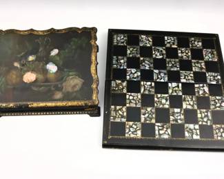 A 19th century Victorian Period games board and writing box.  Papier Mache over wood with inlaid Mother of Pearl, lacquered finish and hand-painted decoration.  Craquelure and some wear to decoration, writing box with minor damage.  Up to 14" long.  