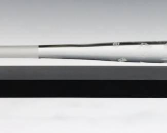 A contemporary Steuben Crystal MLB Collection Detroit Tigers baseball bat, c. 2010.  Features a Crystal bat with engraved Tiger's logos and frosted detail, presented on a Black wooden base.  Minor wear.  Bat is 18" long, 19" long overall.  